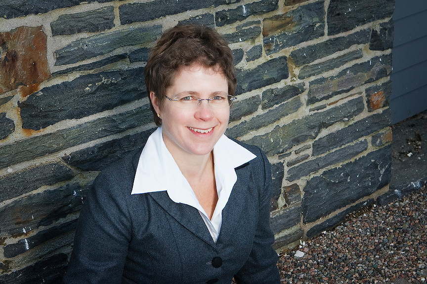 Smiling woman dressed in a business suit